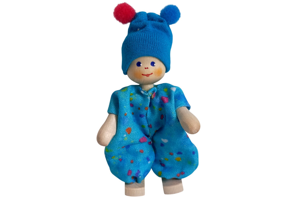Anne Krebs Miniatur Baby mit Bommelmütze blau