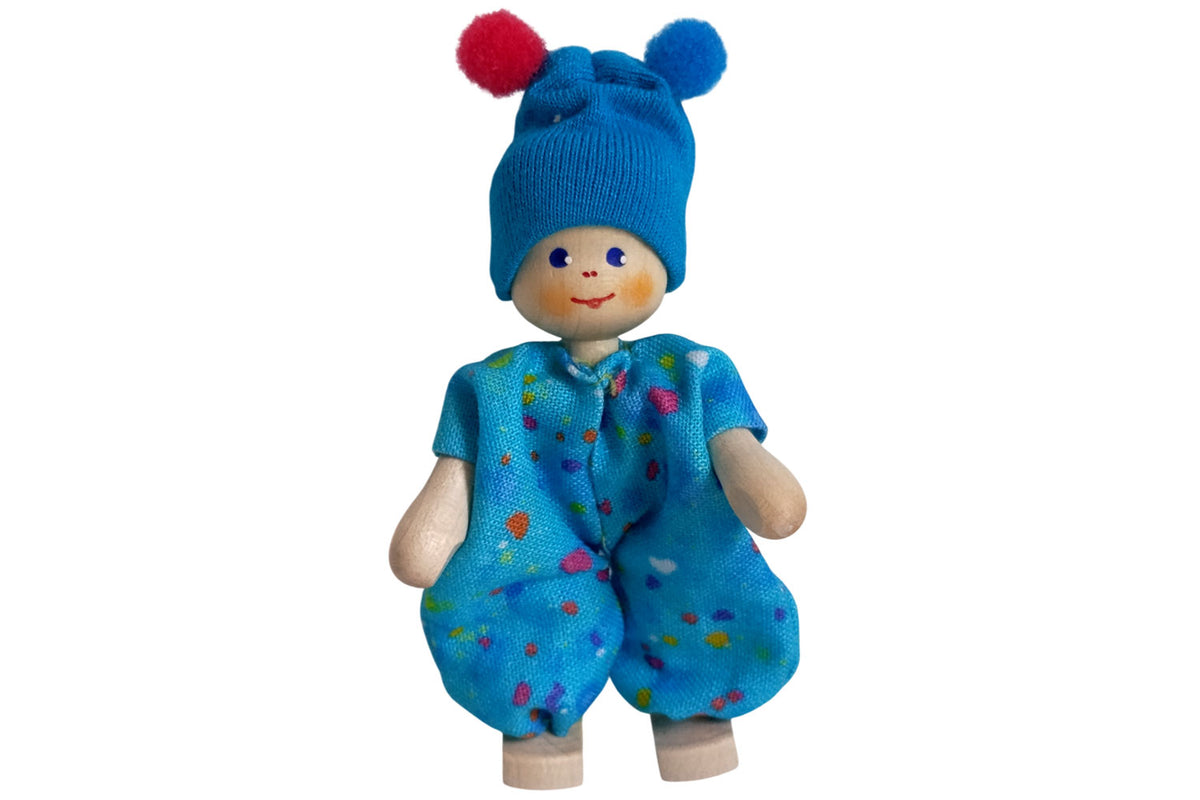 Anne Krebs Miniatur Baby mit Bommelmütze blau