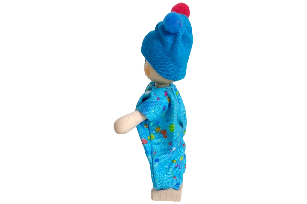 Anne Krebs Miniatur Baby mit Bommelmütze blau