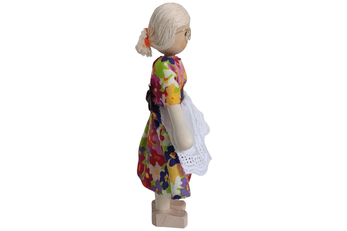Anne Krebs Miniatur Puppe Oma mit Brille, Kleid mit Schürze, Haare weiss