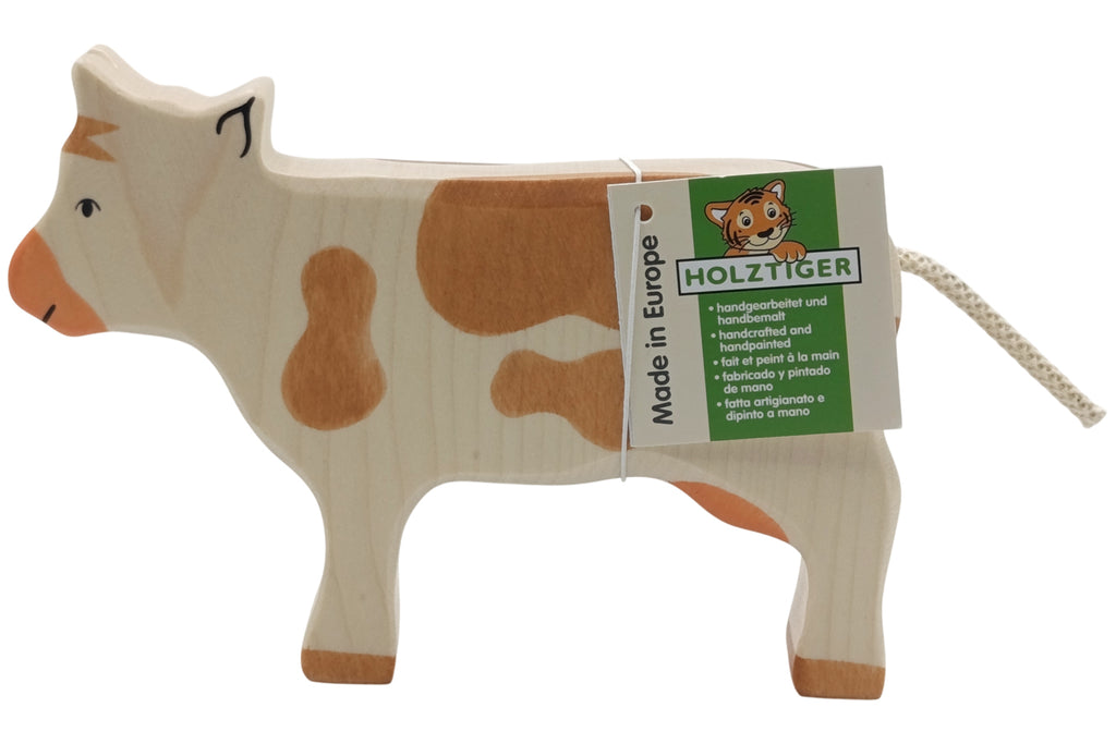 Holztiger Kuh stehend braun