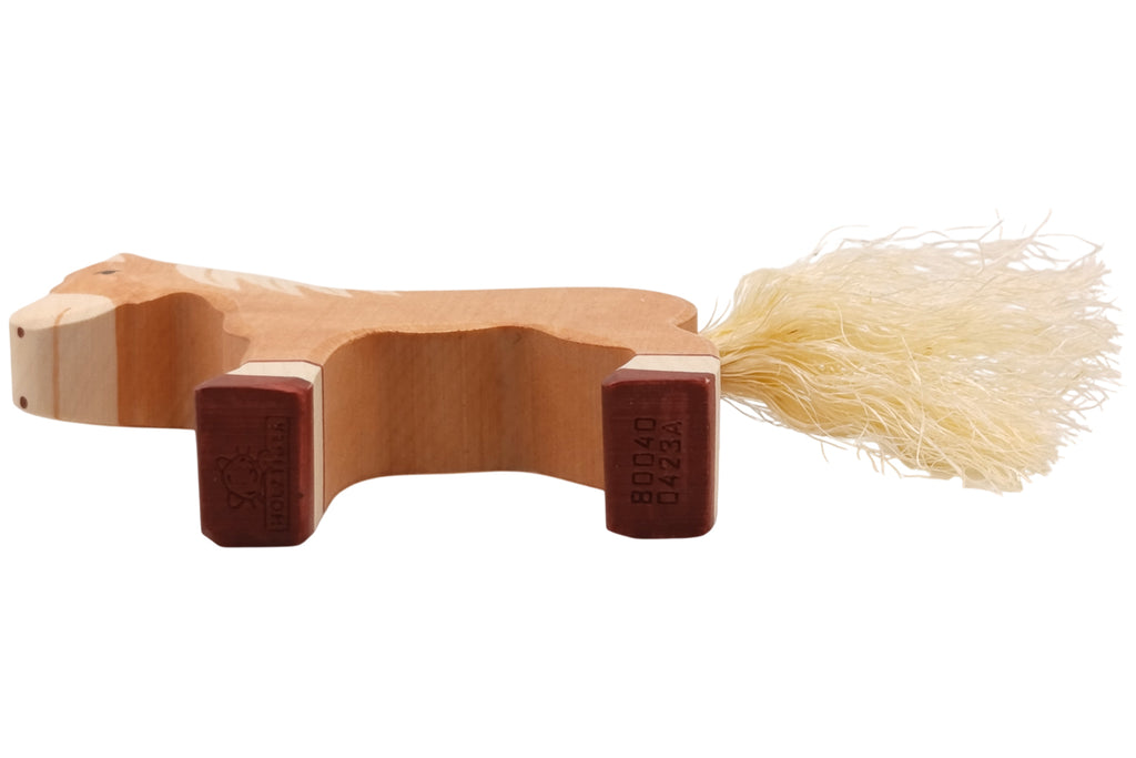Holztiger Fohlen hellbraun stehend