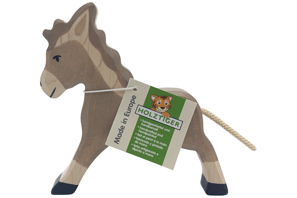 Holztiger Esel laufend