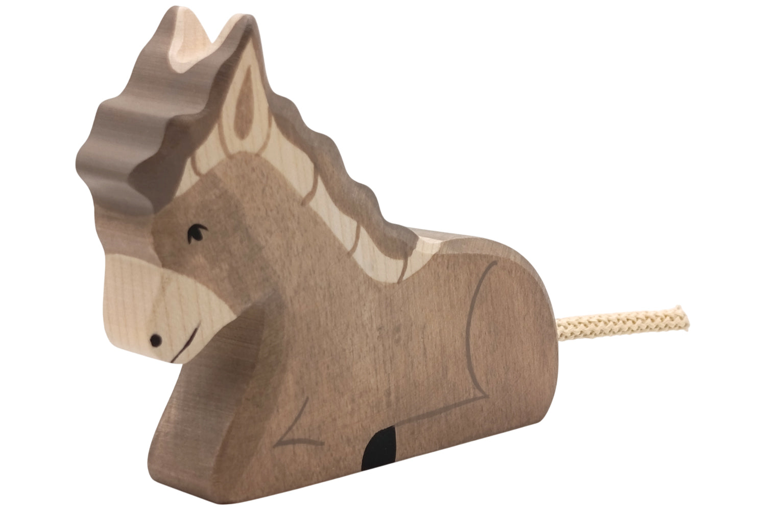 Holztiger Esel liegend