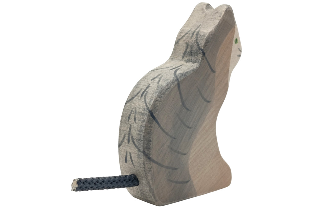 Holztiger Katze sitzend grau