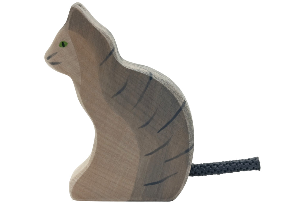 Holztiger Katze sitzend grau