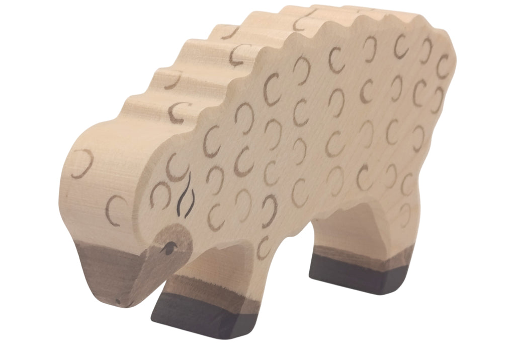 Holztiger Schaf fressend