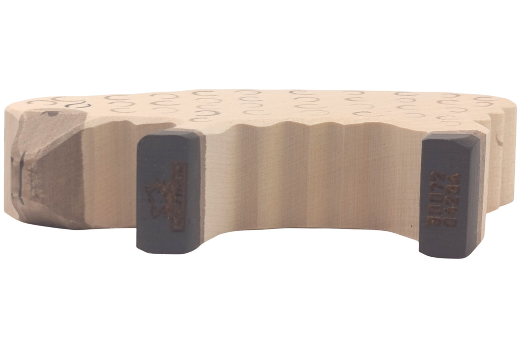 Holztiger Schaf fressend