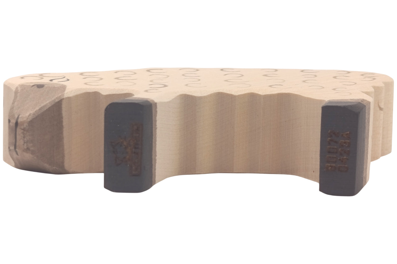 Holztiger Schaf fressend