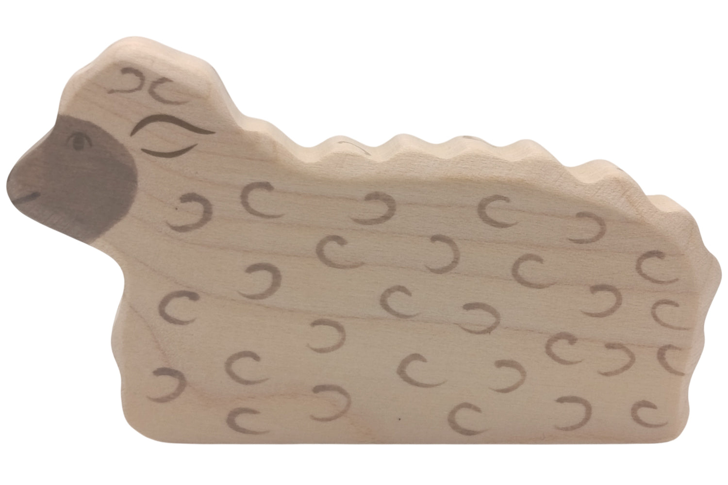 Holztiger Schaf liegend