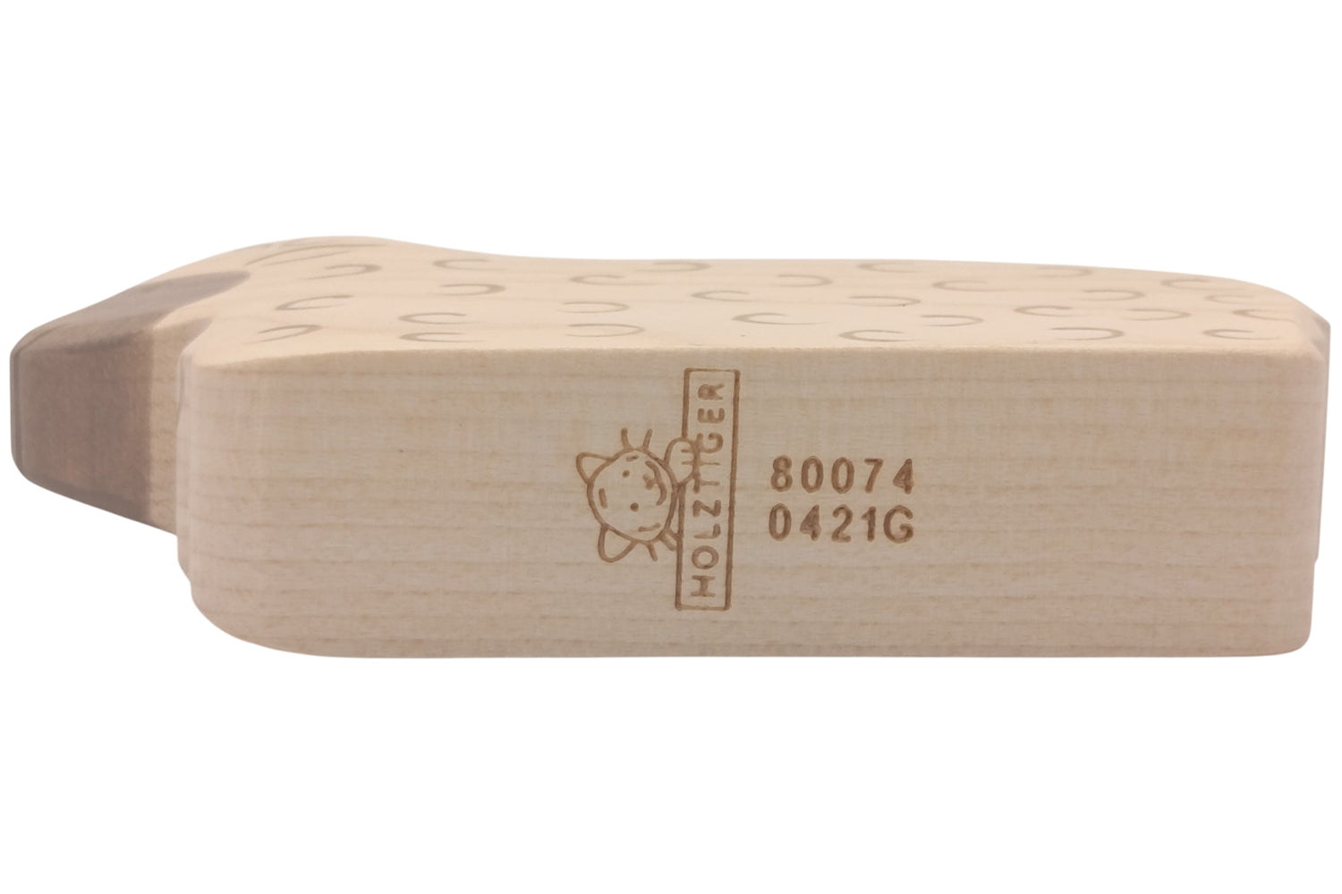 Holztiger Schaf liegend