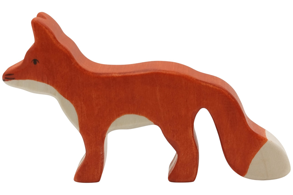 Holztiger Fuchs stehend