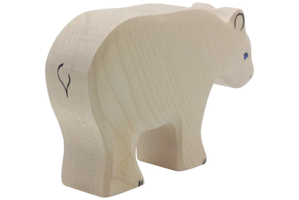 Holztiger Eisbär fressend